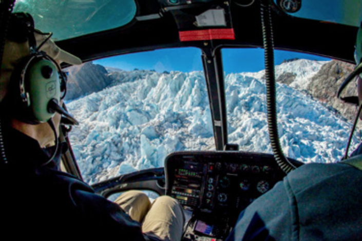 Fly across the clear blue waters of Lake Wanaka, cross over the Southern Alps main divide where you will see the soaring high peaks of Mount Aspiring National Park and multiple spectacular glaciers above native NZ forest.